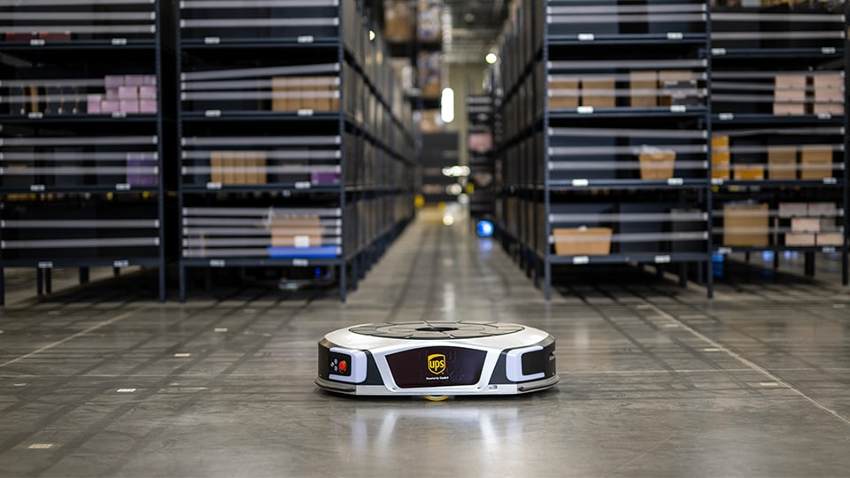 Automotive robot navigating through a warehouse