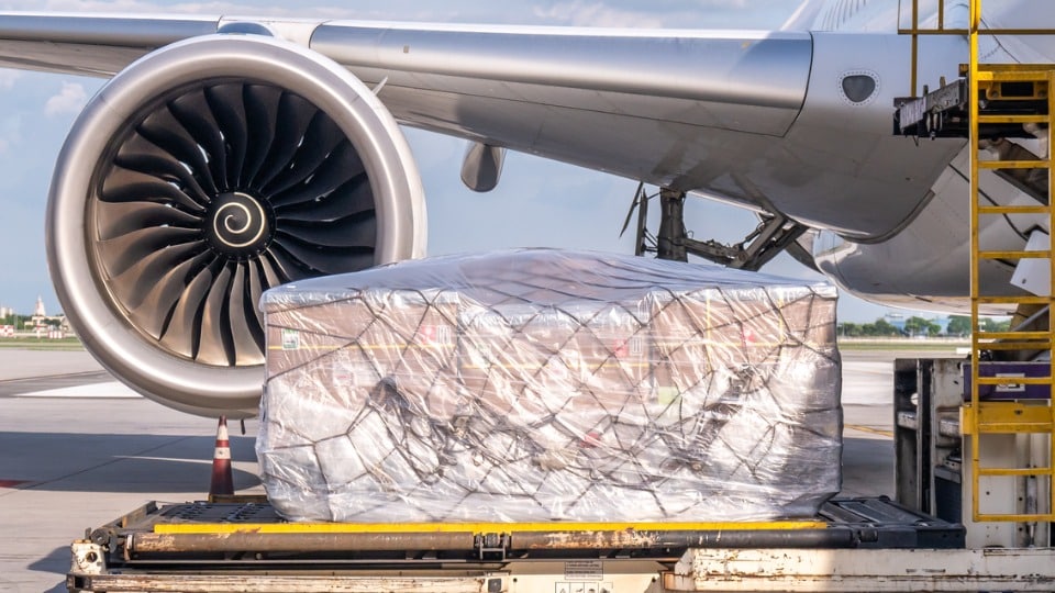 Air freight cargo being loaded into a plane